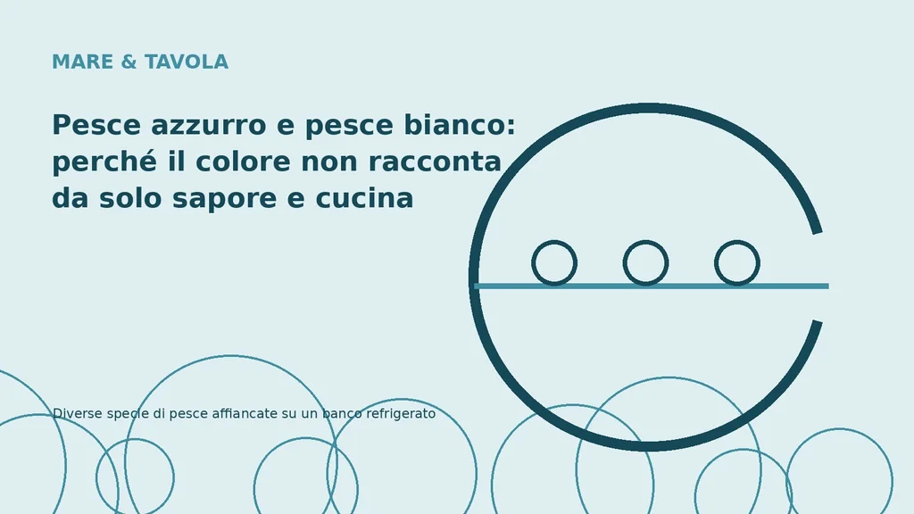 Diverse specie di pesce affiancate su un banco refrigerato